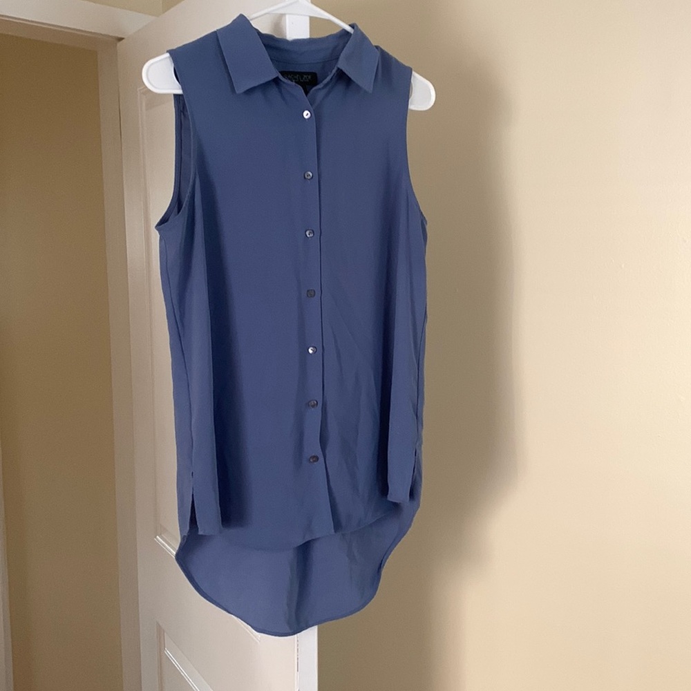 Button down, sleeveless blouse